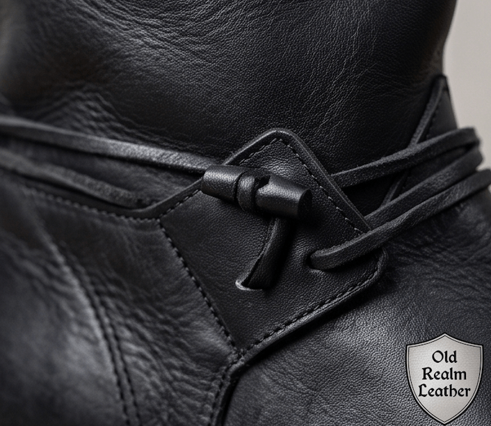 Handmade Black Medieval Boots for Cosplay, Renaissance Fairs featuring full-grain leather, toggles, and laces.