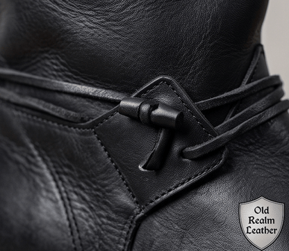 Handmade Black Medieval Boots for Cosplay, Renaissance Fairs featuring full-grain leather, toggles, and laces.