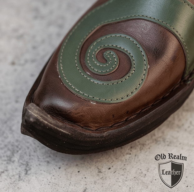 Handmade Brown Medieval Leather Shoes & Viking Style with intricate green swirl design and full-grain leather texture.
