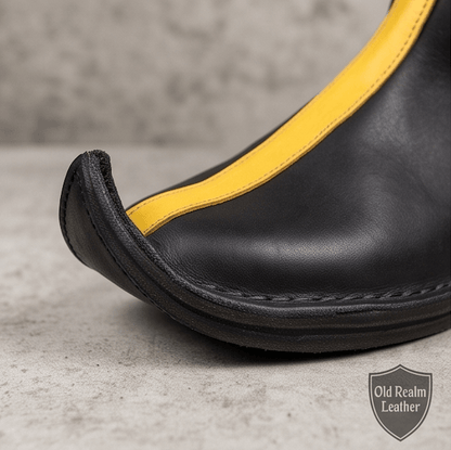 Renaissance Faire Boots Handmade in Leather with black full-grain leather, accented by yellow trim and artisan stitching.