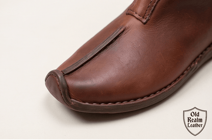 Handmade Viking Leather Boots for LARP & Renaissance Fairs showcasing rich brown full-grain leather with detailed stitching.