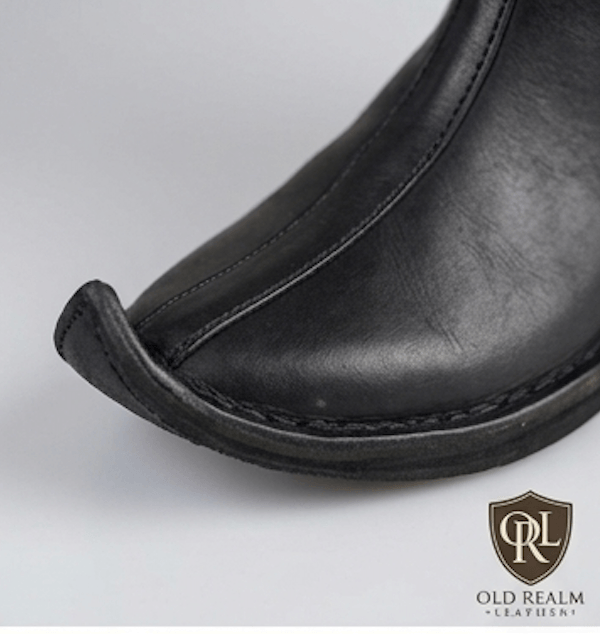 Men's Handmade Medieval Poulaine Boots featuring a sleek black full-grain leather with a distinctive pointed toe.